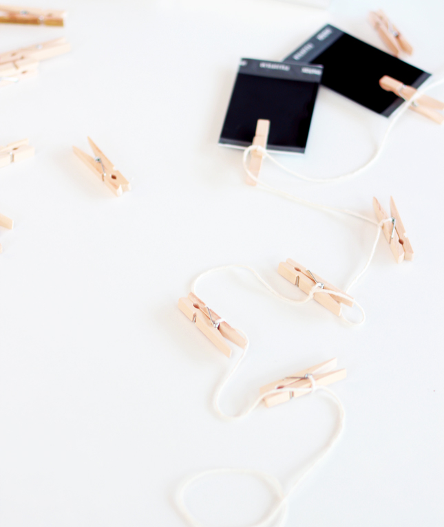 5 Minute DIY | Interchangeable photo garland (via casinositekor.highwallsblog.com)