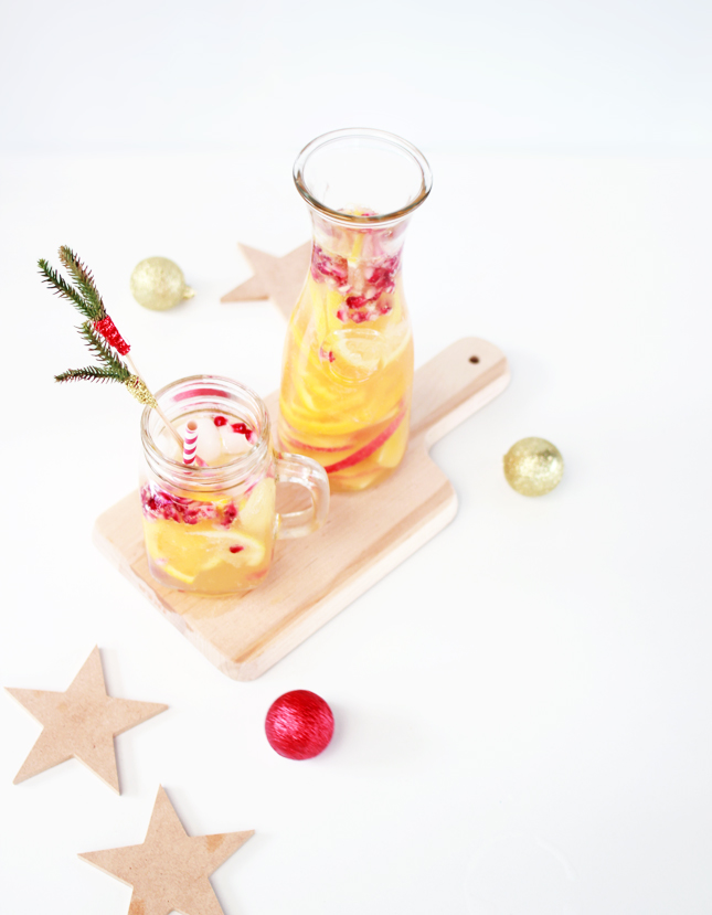 Get boozy on Christmas Day with some  Apple Cider White Sangria - it's just fancy punch!
